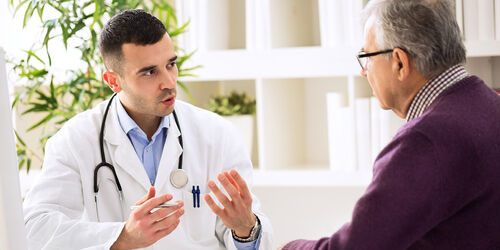 a doctor providing clinical support to a patient